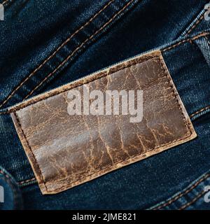 Label or leather label on jeans with space to copy. Blank for applying information. Casual clothing. Stock Photo