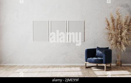 Blank white poster frames mock up on gray wall in modern living room interior with dark blue armchair and wooden floor, scandina Stock Photo