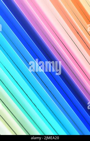 Abstract background of colored lines diagonally. Solid multi-colored surface. Minimalist backdrop Stock Photo