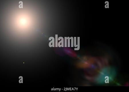 Lens flare glow light effect on black background. image of sun rays light effects, overlays or flare isolated on black background for design Stock Photo