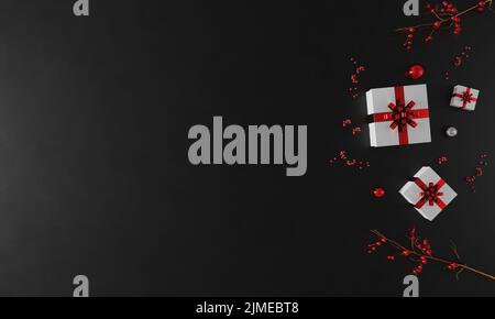 Christmas and New Year holiday black background mockup. New Year decoration flat lay. Christmas gree Stock Photo