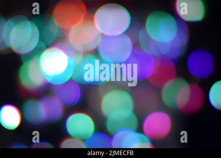 Abstract blurred lights or colorful confetti festive background Stock Photo