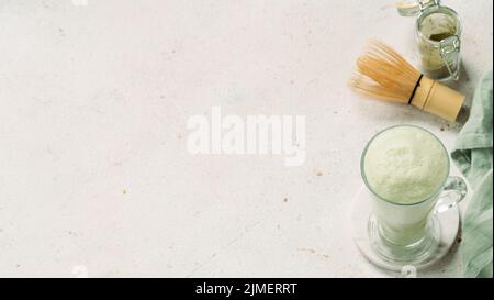 Green foam texture of matcha latte, close up Stock Photo