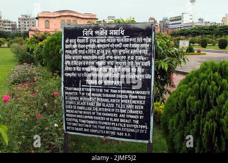 Dhaka, Bangladesh - September 17, 2007: Plaque with information about the tomb of Bibipari in English and Bengali Stock Photo