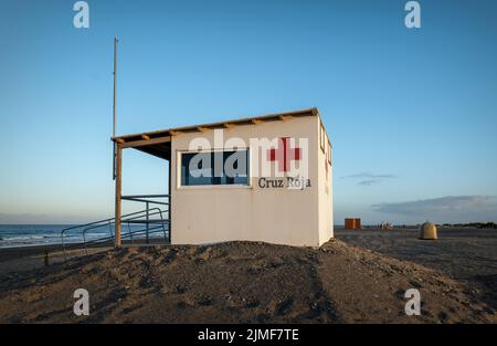 Spanish Red Cross, lifeguard ("Cruz Roja") on beach at sunset. Stock Photo