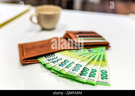 Euro banknotes. A lot of paper many in the wallet. Cash Stock Photo