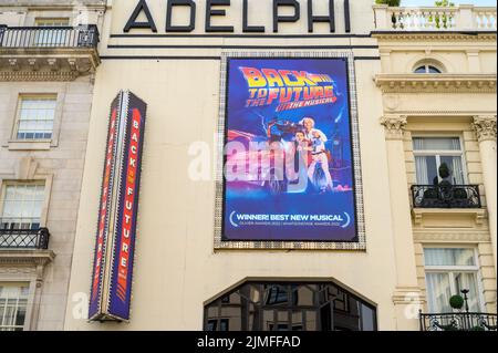 LONDON - May 18, 2022: Back to the Future, The Musical sign on the front of The Adelphi Theatre, London Stock Photo