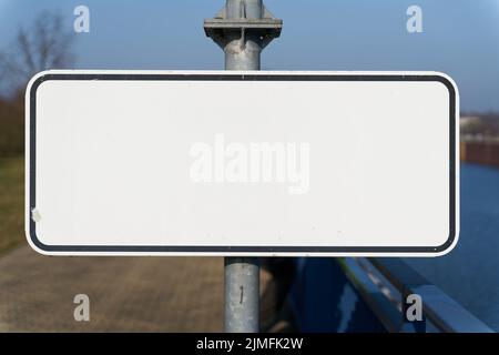 Blank white sign with text space on a pillar Stock Photo