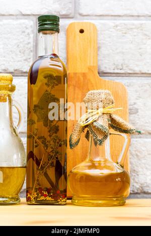 Extra virgin healthy Olive oil on grey bricks background Stock Photo