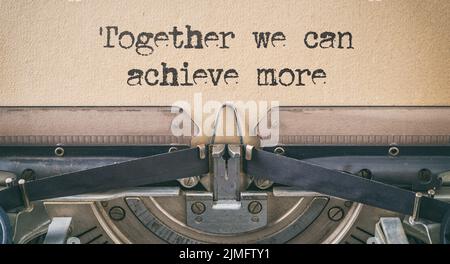 Vintage typewriter - Together we can achieve more Stock Photo