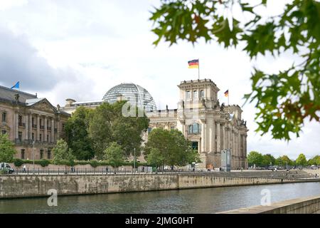 The Reichstag in Berlin on the banks of the Spree River Stock Photo