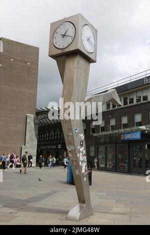 The Clyde Clock, Killermont Street, Glasgow, Scotland, UK. The cube shaped clock – perched on top of a pair of stainless steel legs, 20 feet high – reminds locals to run on time every single day. The iconic clock is actually a sculpture know as Running Time, and was created by the late George Wyllie, the Glasgow-born artist. George Wyllie passed away in May 2012, aged 90. In a superstitious turn of events, the Clyde Clock stopped working shortly after the artist’s death. Stock Photo