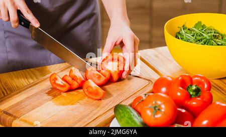 vegetarian lifestyle cooking chopping tomatoes Stock Photo