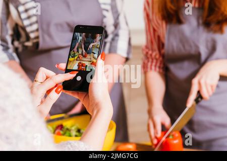 online cooking class women vegetable salad Stock Photo