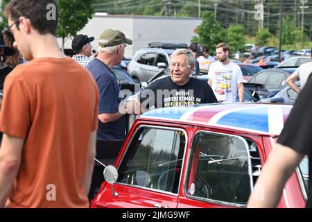 Durham, NC, USA, 6th August 2022, Car enthusiasts gather to see the exotic and classic cars at the monthly Cars and Coffee event. Credit D Guest Smith / Alamy Live News Stock Photo