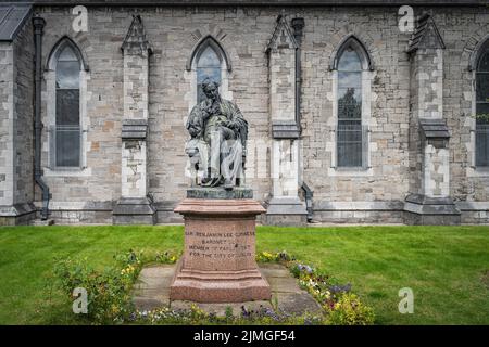 Statue of Benjamin Lee Guinness next to St. Patricks Cathedral, Ireland Stock Photo