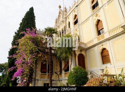 A gorgeous palace of the Borghese Cavazza family on the island Isola del Garda on lake Garda, Italy (06 October 2019) Stock Photo