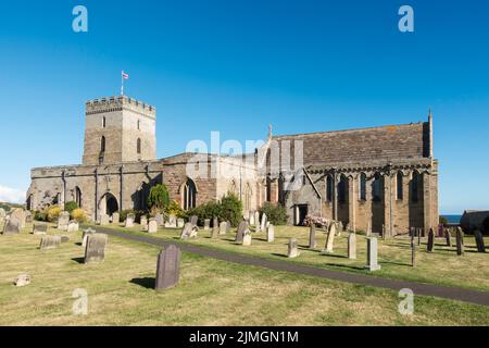 The Parish Church of St. Aidan a grade I listed building in Bamburgh, Northumberland, England, UK Stock Photo