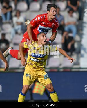 Kortrijk's Aleksandar Radovanovic and STVV's Gianni Bruno fight for the ball during a soccer match between KV Kortrijk and Sint-Truiden VV, Saturday 06 August 2022 in Kortrijk, on day 3 of the 2022-2023 'Jupiler Pro League' first division of the Belgian championship. BELGA PHOTO DAVID CATRY Stock Photo