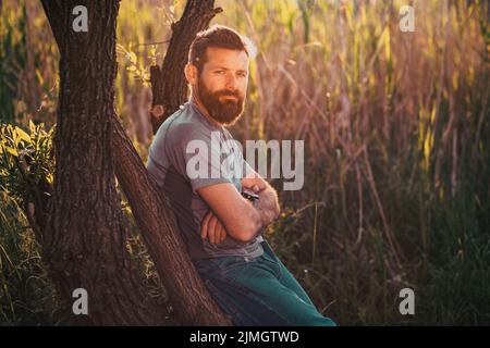 Handsome man enjoying nature outdoors Stock Photo