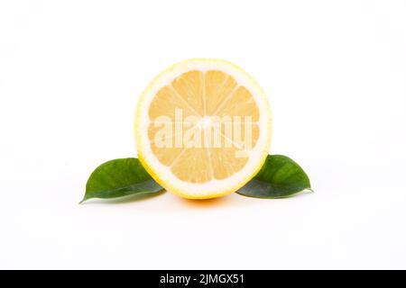 Fresh lemon with leaves on a white background Stock Photo