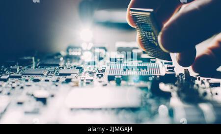 engineer motherboard computer technology repair Stock Photo
