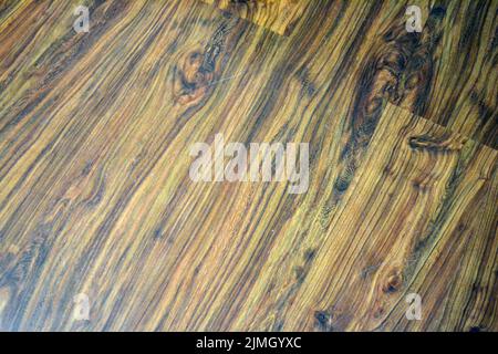 Interesting and intriguing wooden background with an pattern, textured lines. Stock Photo