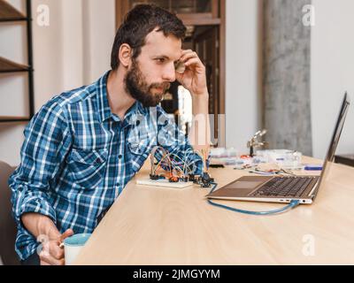 programmer workplace engineer program download Stock Photo
