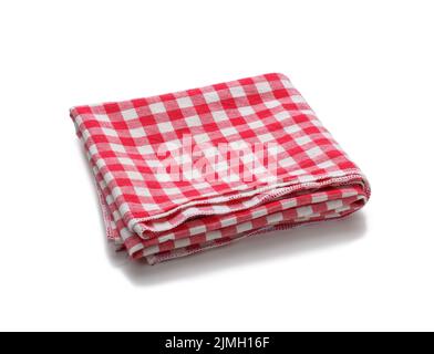 Folded cotton red white checkered napkin on a white background Stock Photo