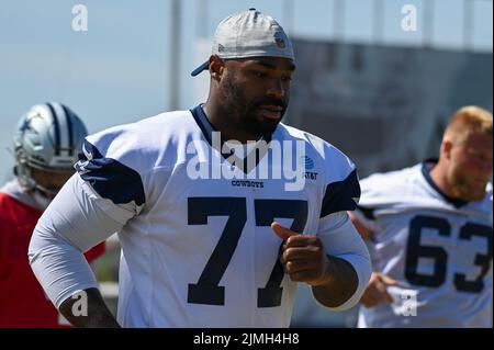 Dallas Cowboys tackle Tyron Smith (77) blocks for wide receiver Cole  Beasley (11) against the New York Giants on Sunday, Sept. 13, 2015, at AT&T  Stadium in Dallas. (Photo by Richard W.