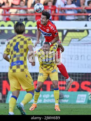 STVV's Gianni Bruno and Kortrijk's Aleksandar Radovanovic fight for the ball during a soccer match between KV Kortrijk and Sint-Truiden VV, Saturday 06 August 2022 in Kortrijk, on day 3 of the 2022-2023 'Jupiler Pro League' first division of the Belgian championship. BELGA PHOTO DAVID CATRY Stock Photo