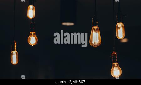 loft interior lighting antique filament bulbs Stock Photo