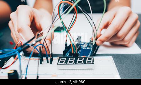 electronics experiment technician construction Stock Photo