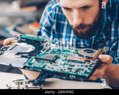 hardware diagnostics disassembled laptop computer Stock Photo