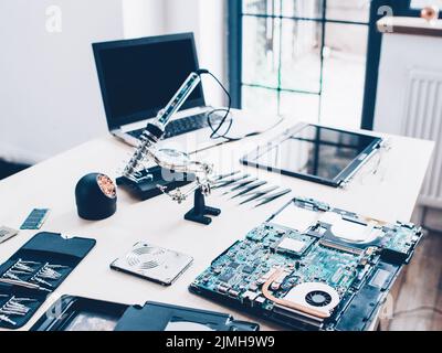 tech support engineer workplace laptop tools Stock Photo