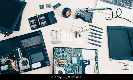 tech support engineer workplace laptop tools Stock Photo