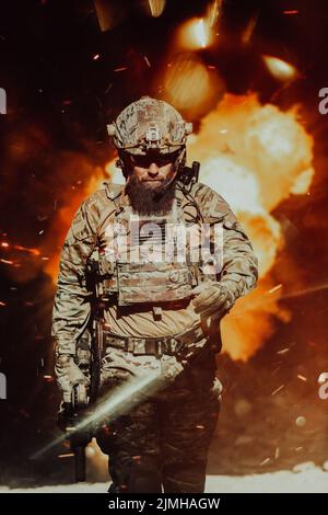 A bearded soldier in a special forces uniform walks through an abandoned building after a successful mission. Selection focus Stock Photo