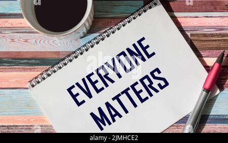 Everyone matters inspirational reminder - notepad handwriting, equality, respect, inclusiveness and community concept Stock Photo