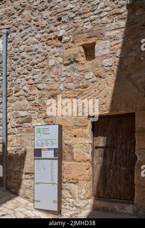 entrance door on the facade of the old prison in the town of Culla, declared the most beautiful in Spain, Castellon, Spain, Europe Stock Photo