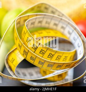 Measuring tape for measuring the circumference. Stock Photo