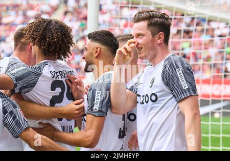 Michael Gregoritsch, FRG 38 celebrates his goal, happy, laugh, celebration, 0-1 with Kiliann Sildillia, FRG 25  in the match FC AUGSBURG - SC FREIBURG 0-4 1.German Football League on Aug 06, 2022 in Augsburg, Germany. Season 2022/2023, matchday 1, 1.Bundesliga, FCB, Munich, 1.Spieltag © Peter Schatz / Alamy Live News    - DFL REGULATIONS PROHIBIT ANY USE OF PHOTOGRAPHS as IMAGE SEQUENCES and/or QUASI-VIDEO - Stock Photo
