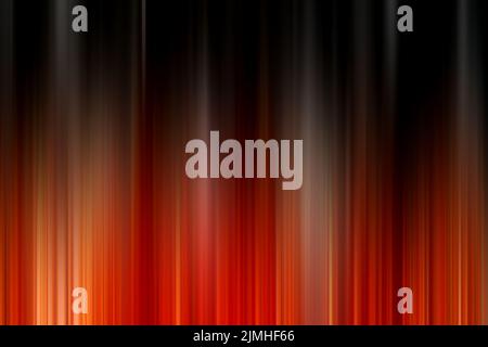 Abstract vertical orange and black lines background. Streaks are blurry in motion. Stock Photo