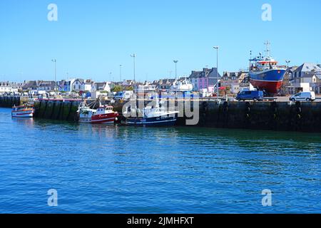 LE GUILVINEC, FRANCE -13 AUG 2021- View of fishing boats in Le Guilvinec, a major port for fisheries in the Finistere department of Brittany, France. Stock Photo