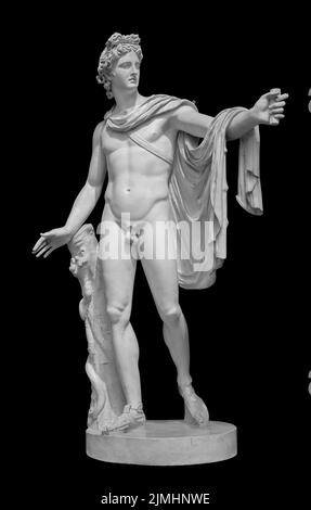 God Apollo sculpture. Ancient Greek god of Sun and Poetry Plaster copy of a marble statue isolated on black with clipping path Stock Photo