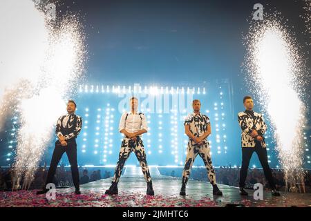 Westlife on stage at Wembley Stadium, London, during their sell-out show at the venue. Picture date: Saturday August 6, 2022. Stock Photo