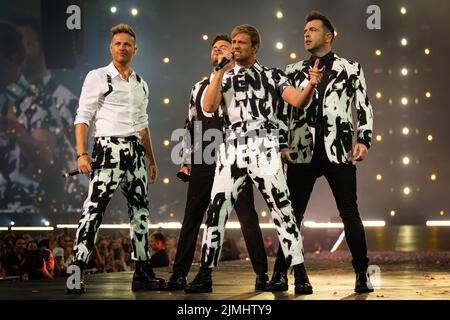 Westlife on stage at Wembley Stadium, London, during their sell-out show at the venue. Picture date: Saturday August 6, 2022. Stock Photo