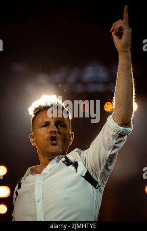 Nicky Byrne of Westlife performs on stage at Wembley Stadium, London, during their sell-out show at the venue. Picture date: Saturday August 6, 2022. Stock Photo