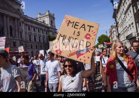 London, UK. 6th August 2022. Protesters march through Whitehall. Thousands of people marched through central London in support of animal rights and veganism, and called for an end to speciesism and all forms of animal exploitation. Credit: Vuk Valcic/Alamy Live News Stock Photo