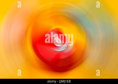 Abstract Background Of colorful Spin Circle Radial Motion Blur. Stock Photo