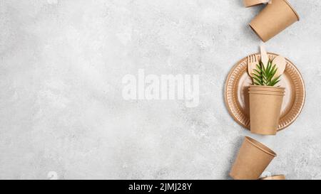 Eco friendly disposable paper tableware copy space arrangement Stock Photo